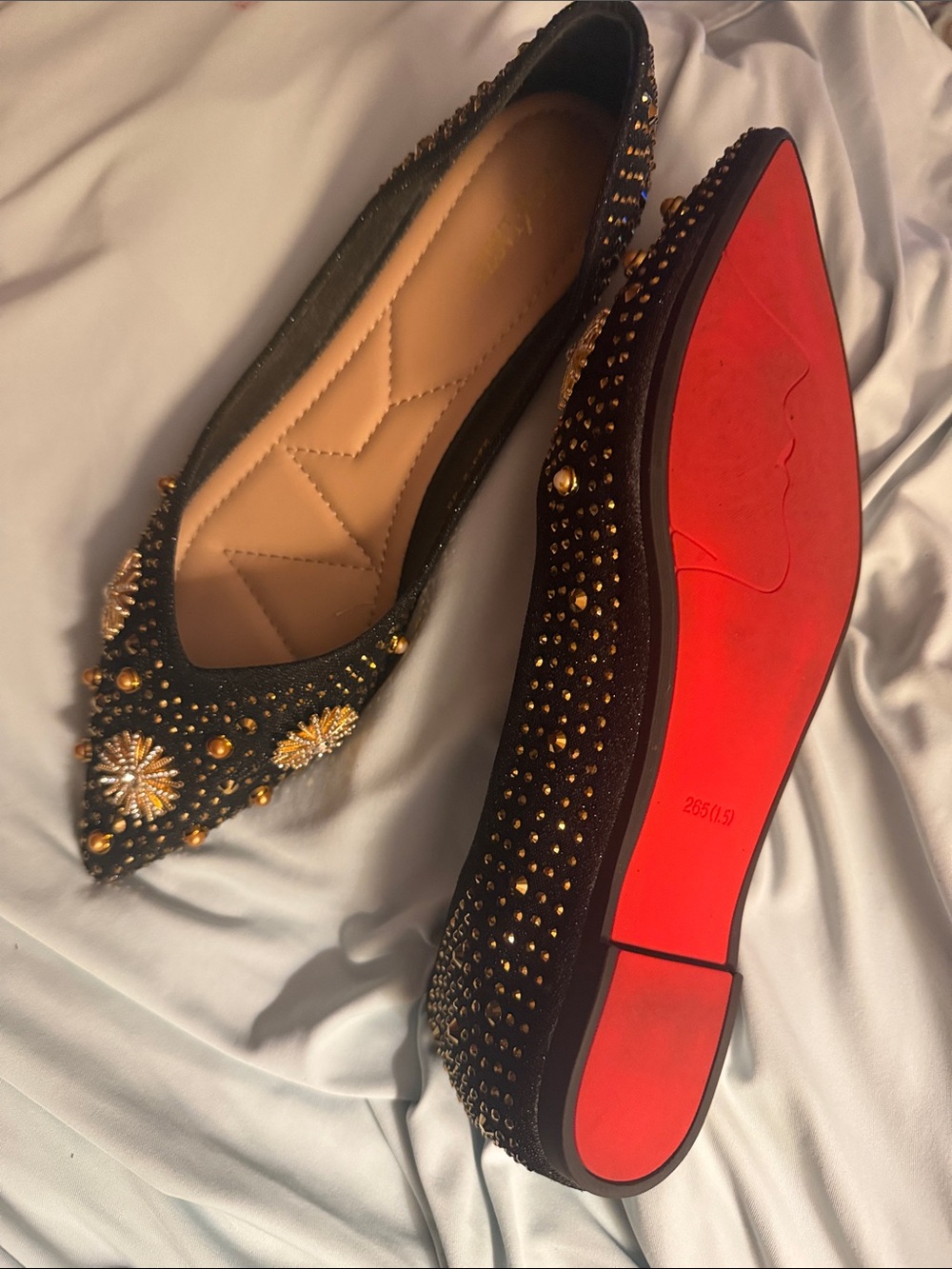 Embellished Black Pointed Toe Flats with Gold Studs and Red Outsole